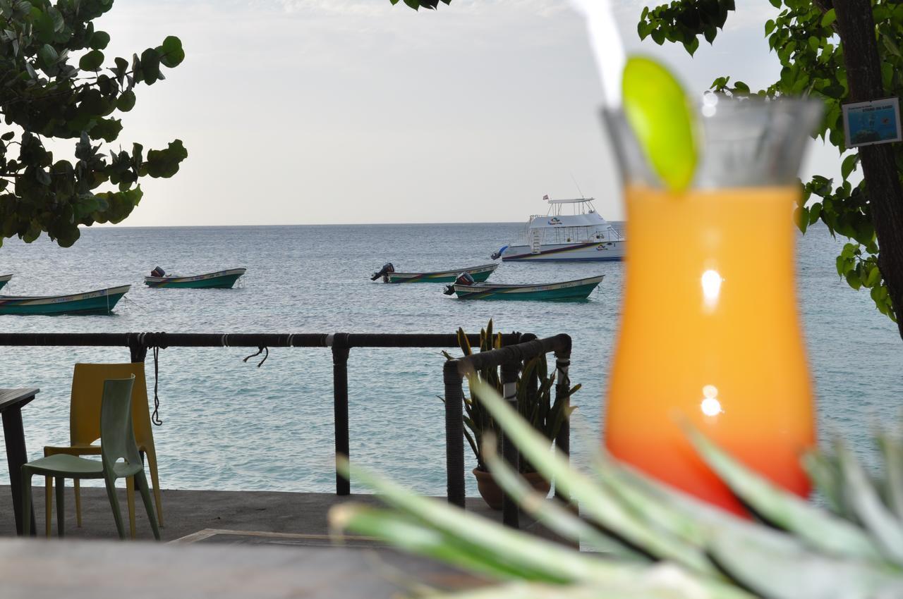 Paradise Island Beach Resort Punta Rucia Bagian luar foto