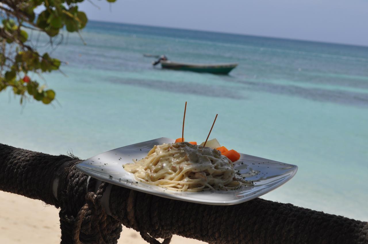Paradise Island Beach Resort Punta Rucia Bagian luar foto